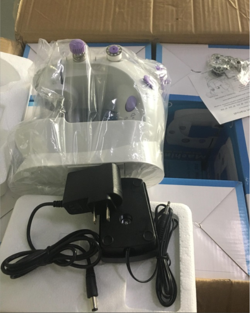 Mini machine à coudre électrique